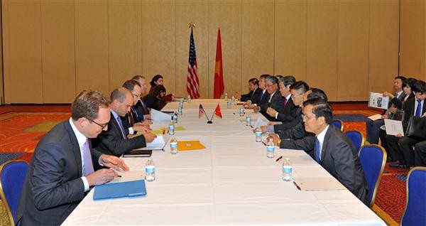 Politburo member Dinh The Huynh meets with US Secretary of State John Kerry - ảnh 2